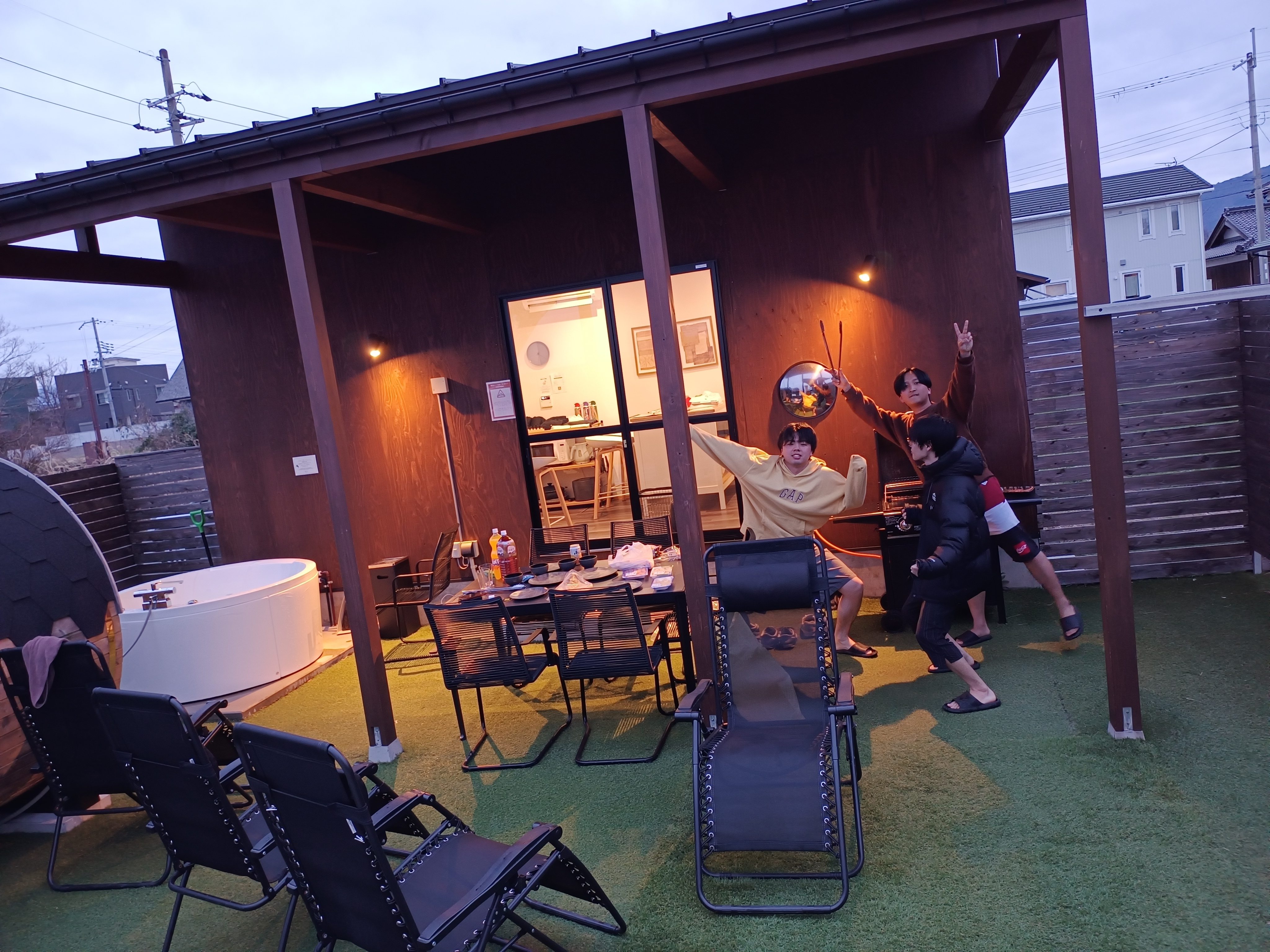 Outdoor relaxation area with friends enjoying evening